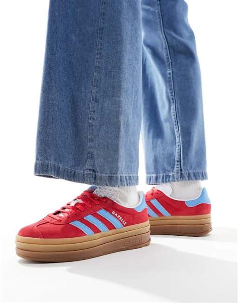 red and blue adidas gazelle